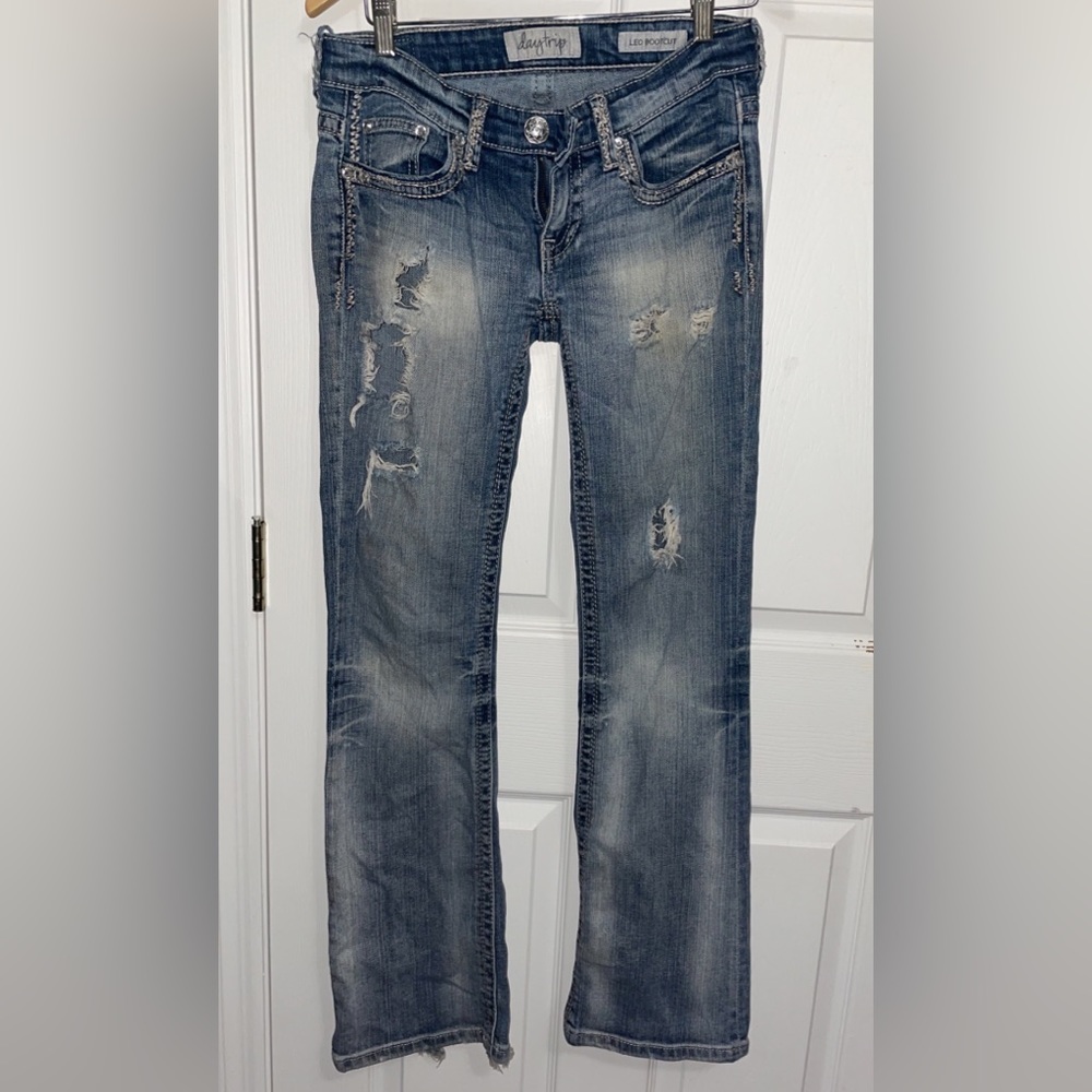 Low-rise Distressed Bootcut Jeans